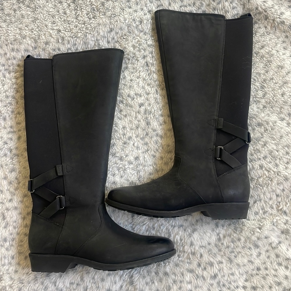 Teva. Waterproof. Black, tall knee high boot. Zips. Size 8. Brand new!